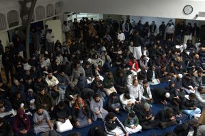 Congregation attending a night prayer